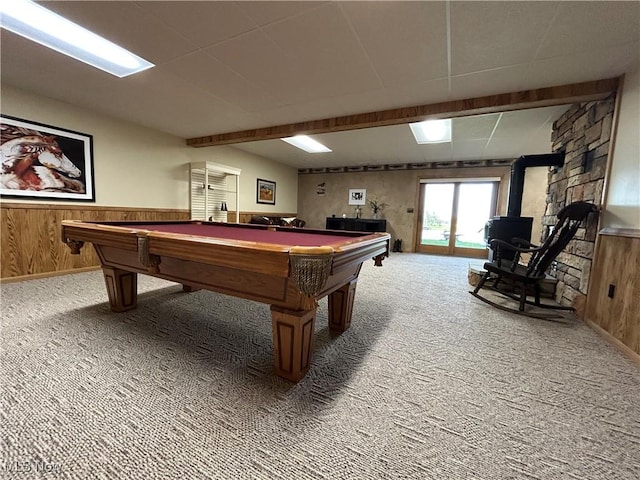 165 Township Rd Unit 1461, Greenwich, OH 44805 - recreation room featuring a wood stove, carpet, billiards, and wood walls