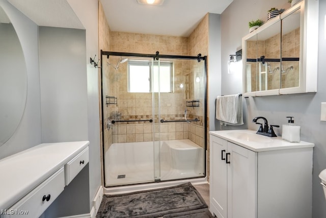 396 2nd St NE, Carrollton, OH 44615 - bathroom featuring a stall shower, vanity, and toilet
