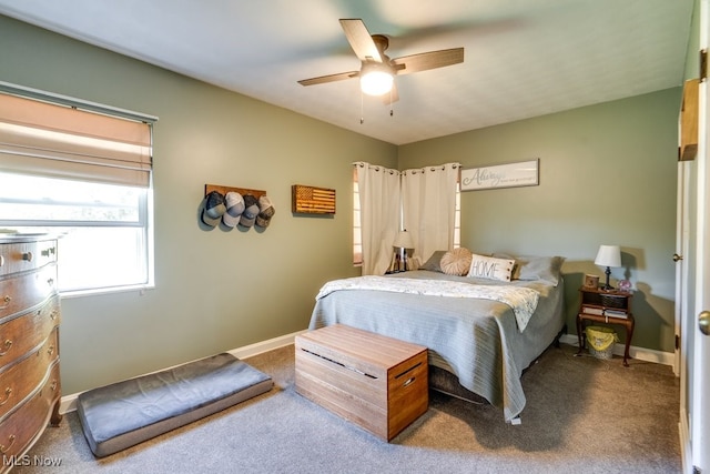 396 2nd St NE, Carrollton, OH 44615 - carpeted bedroom with ceiling fan and baseboards