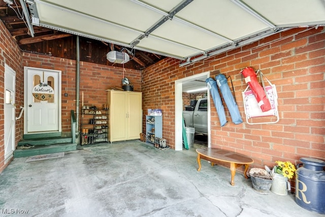 396 2nd St NE, Carrollton, OH 44615 - garage featuring a garage door opener