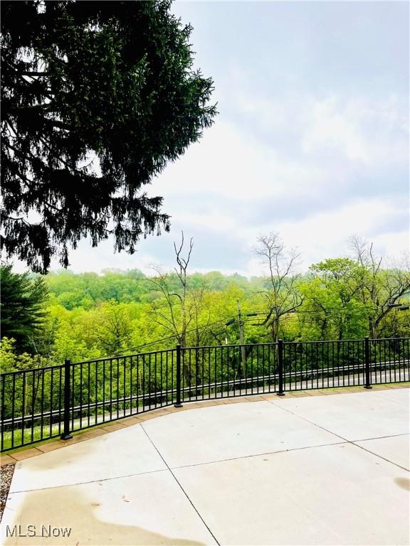 396 2nd St NE, Carrollton, OH 44615 - view of patio featuring fence
