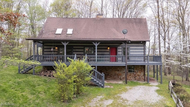 6570 State Route 339, Vincent, OH 45784 - cabin featuring stairway, a deck, a chimney, and a front yard