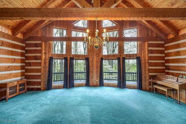 6570 State Route 339, Vincent, OH 45784 - unfurnished living room featuring wood ceiling, a chandelier, carpet floors, and high vaulted ceiling