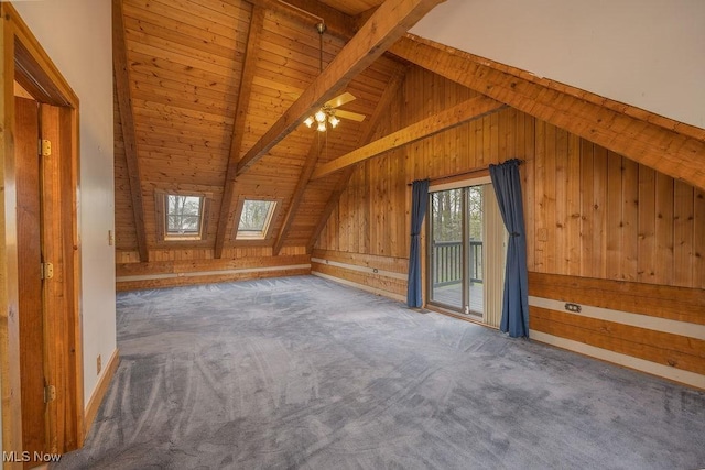 6570 State Route 339, Vincent, OH 45784 - bonus room featuring a ceiling fan, carpet, wood ceiling, wooden walls, and lofted ceiling with beams
