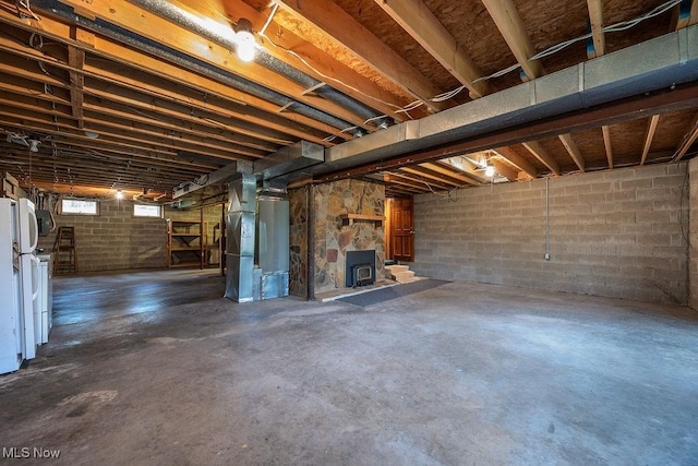 6570 State Route 339, Vincent, OH 45784 - basement with freestanding refrigerator and a wood stove