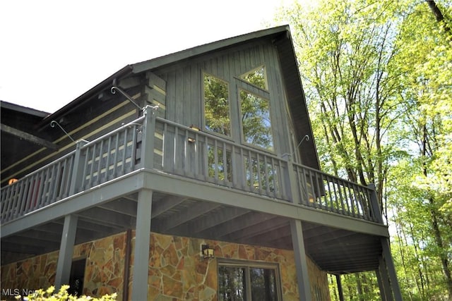 6570 State Route 339, Vincent, OH 45784 - view of side of property with a wooden deck and stone siding