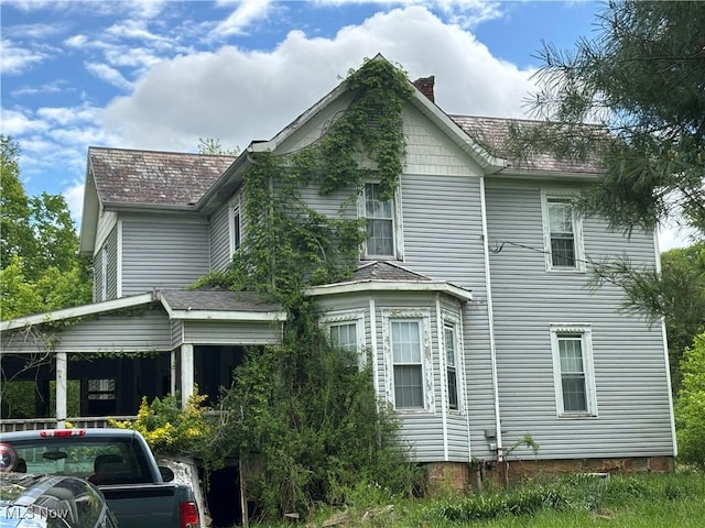 212 Rost Rd, Walker, WV 26180 - view of side of property with a chimney