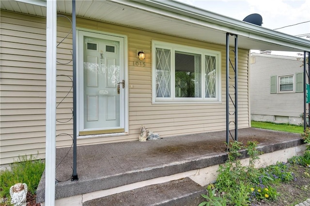 doorway to property with a porch