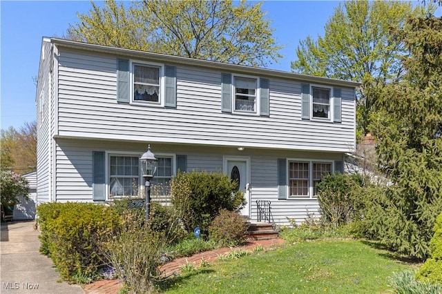 8295 Mentorwood Dr, Mentor, OH 44060 - colonial inspired home with a front yard