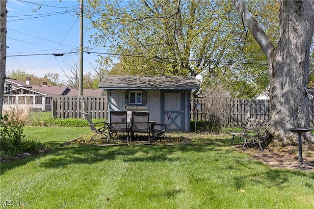 8295 Mentorwood Dr, Mentor, OH 44060 - view of yard featuring a storage unit and an outdoor structure