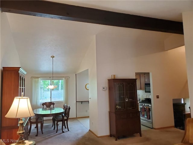 34671 Lake Shore Blvd, Timberlake, OH 44095 - dining room with light carpet, beamed ceiling, baseboards, and high vaulted ceiling