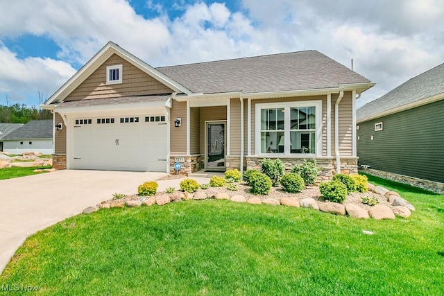 craftsman-style house featuring concrete driveway, an attached garage, a front yard, and stone siding