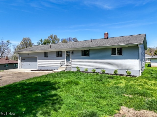 ranch-style house with an attached garage, a front lawn, a chimney, and concrete driveway