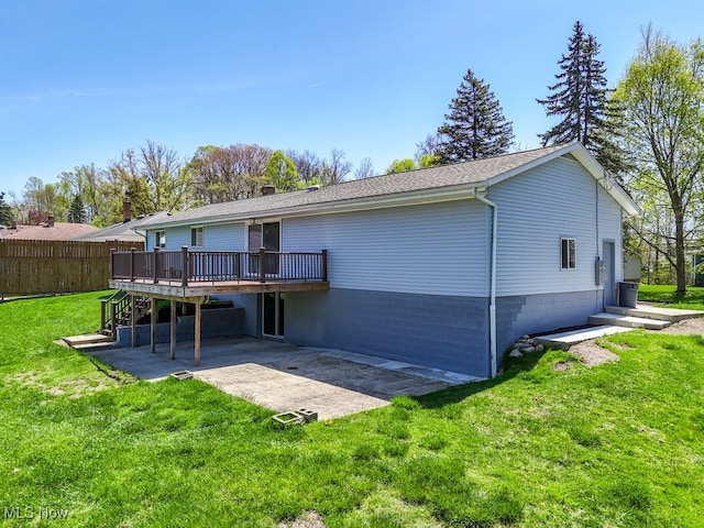 rear view of house featuring a wooden deck, a patio area, and stairway