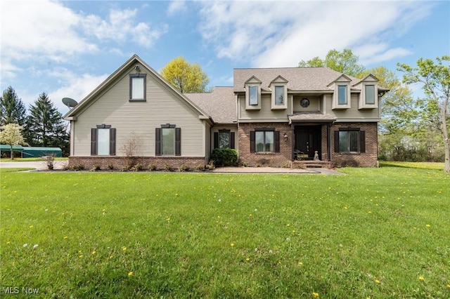 3286 Marks Rd, Medina, OH 44256 - view of front of house with brick siding, a front yard, and roof with shingles