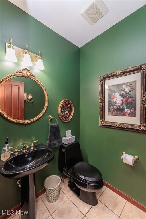 3286 Marks Rd, Medina, OH 44256 - bathroom featuring tile patterned flooring, a sink, and baseboards