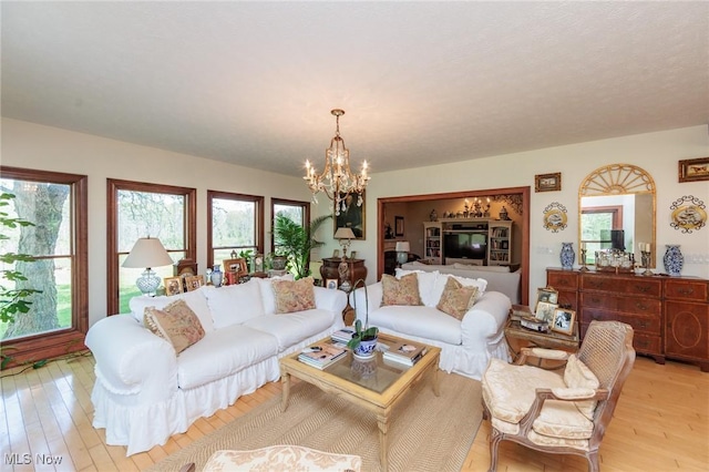 3286 Marks Rd, Medina, OH 44256 - living area featuring a chandelier and light wood-type flooring