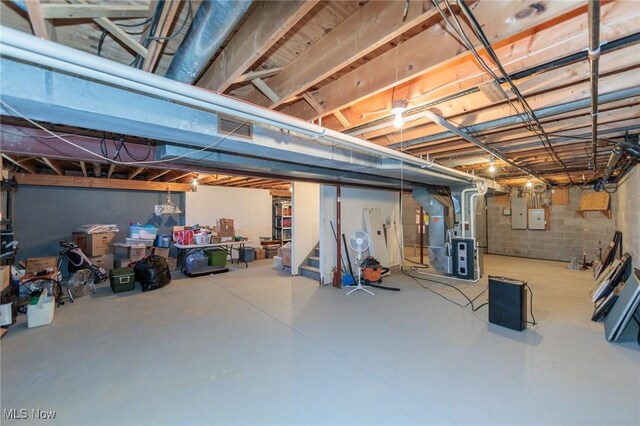 3286 Marks Rd, Medina, OH 44256 - unfinished basement with heating unit, stairs, and electric panel