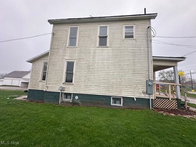 334 Cambridge St N, Cumberland, OH 43732 - view of home's exterior featuring a yard