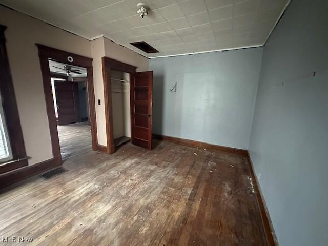 334 Cambridge St N, Cumberland, OH 43732 - unfurnished bedroom featuring hardwood / wood-style flooring, baseboards, and a closet