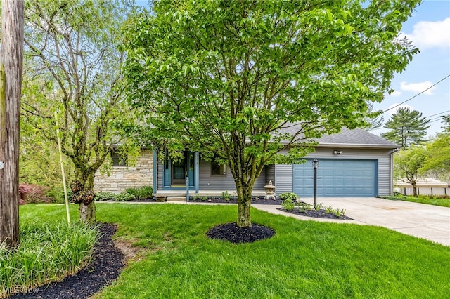 view of property hidden behind natural elements featuring driveway, an attached garage, a front yard, stone siding, and a shingled roof