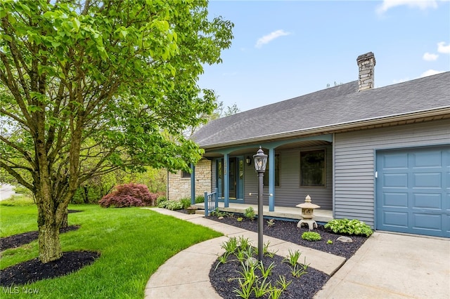 view of front of property featuring a porch, a front yard, a chimney, a shingled roof, and stone siding