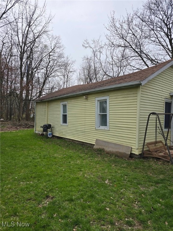 4385 Burkey Rd, Austintown, OH 44515 - view of home's exterior with a yard