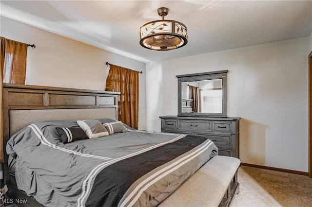 312 58th St, Vienna, WV 26105 - bedroom featuring light carpet and baseboards