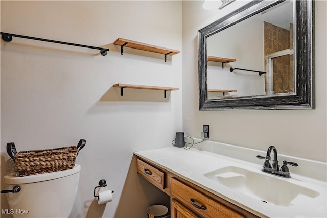 312 58th St, Vienna, WV 26105 - bathroom featuring toilet and vanity