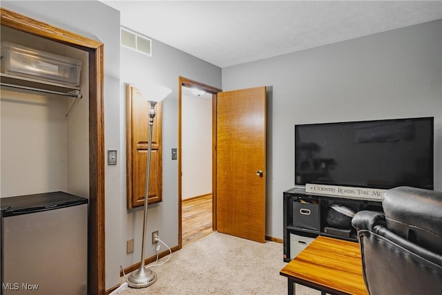 312 58th St, Vienna, WV 26105 - carpeted living room featuring baseboards