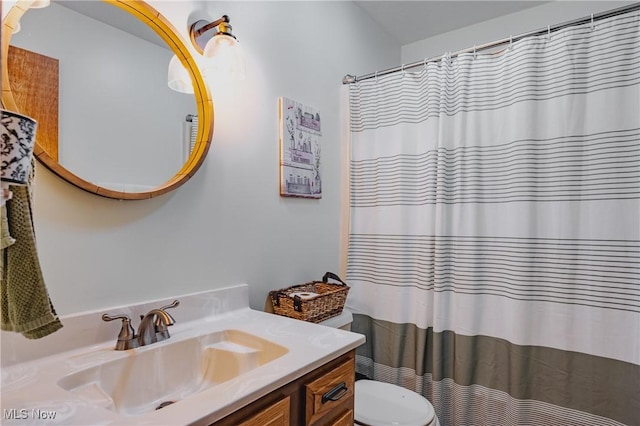 312 58th St, Vienna, WV 26105 - full bathroom with toilet, vanity, and a shower with shower curtain