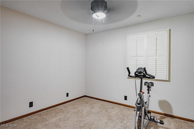 312 58th St, Vienna, WV 26105 - workout room with carpet floors, ceiling fan, and baseboards