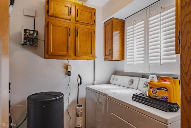 312 58th St, Vienna, WV 26105 - washroom with washing machine and dryer and cabinet space