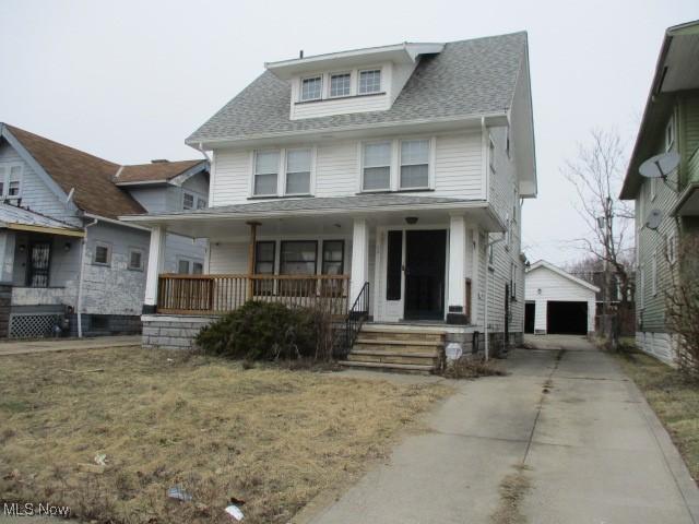 13817 Bartlett Ave, Cleveland, OH 44120 - american foursquare style home with a detached garage, an outdoor structure, covered porch, and roof with shingles