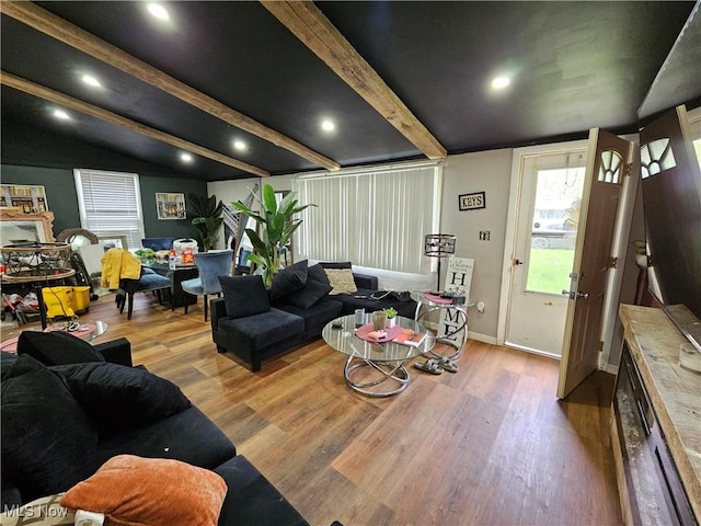 living room featuring wood finished floors, recessed lighting, and baseboards