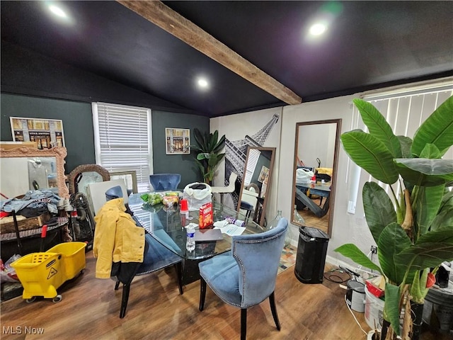 dining room featuring wood finished floors and recessed lighting