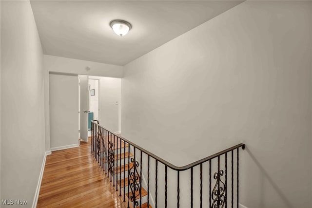 2508 Ashurst Rd, University Heights, OH 44118 - stairs featuring wood finished floors and baseboards