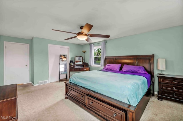 2508 Ashurst Rd, University Heights, OH 44118 - bedroom featuring light colored carpet, baseboards, and ceiling fan