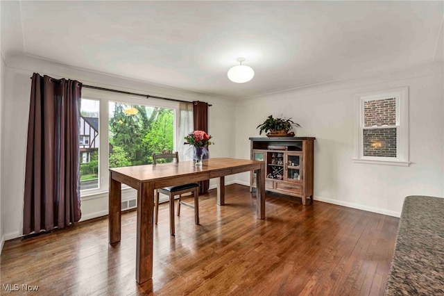 2508 Ashurst Rd, University Heights, OH 44118 - dining area featuring dark wood-type flooring and baseboards