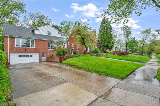 2508 Ashurst Rd, University Heights, OH 44118 - view of property exterior with brick siding, concrete driveway, an attached garage, a lawn, and roof with shingles