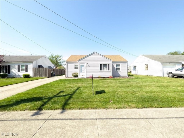 view of front of home featuring concrete driveway