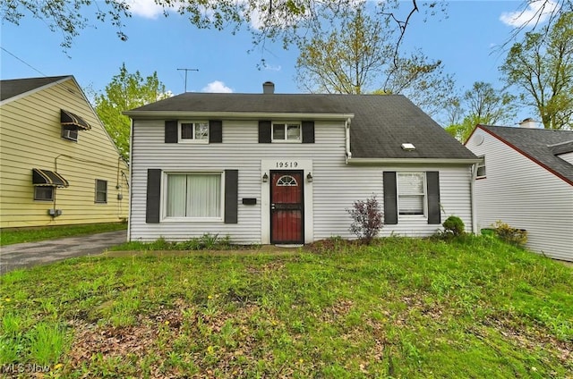19519 Meadowlark Ln, Warrensville Heights, OH 44128 - view of front facade with a chimney