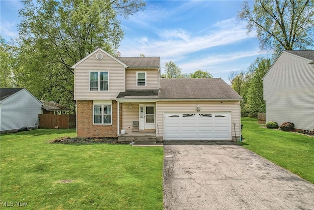 4815 Shadow Oak Dr, Austintown, OH 44515 - traditional-style house with brick siding, driveway, and an attached garage
