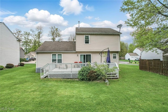 4815 Shadow Oak Dr, Austintown, OH 44515 - back of property featuring a deck, central AC, and a shingled roof
