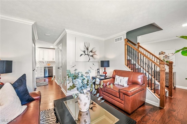 4815 Shadow Oak Dr, Austintown, OH 44515 - living area featuring wood finished floors, ornamental molding, stairs, and baseboards