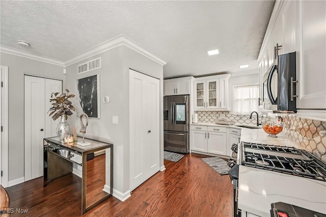 4815 Shadow Oak Dr, Austintown, OH 44515 - kitchen featuring stainless steel fridge with ice dispenser, dark wood-type flooring, backsplash, glass insert cabinets, and ornamental molding