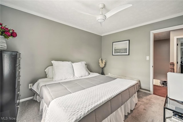 4815 Shadow Oak Dr, Austintown, OH 44515 - carpeted bedroom with baseboards, ornamental molding, and ceiling fan
