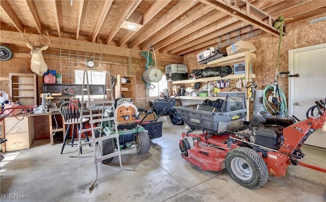 garage featuring a workshop area