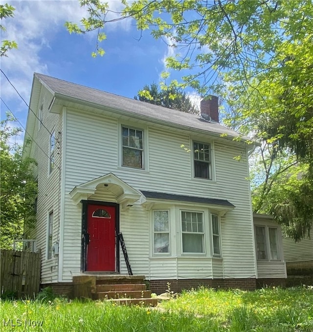 244 Helen Ave, Mansfield, OH 44903 - view of front of property with a chimney, entry steps, fence, and cooling unit