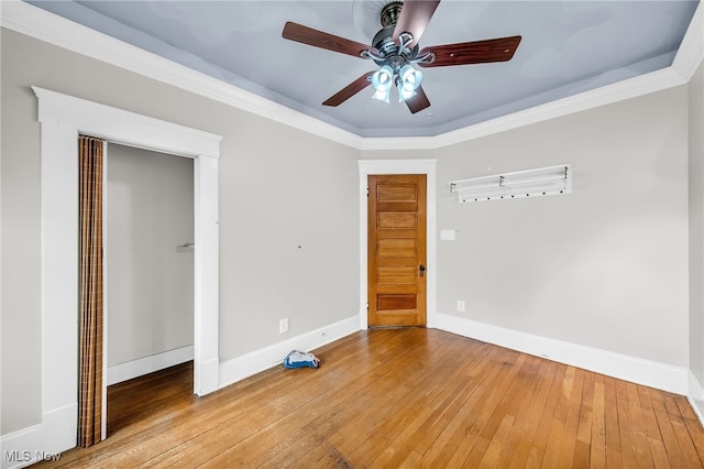 26561 Butternut Ridge Rd, North Olmsted, OH 44070 - unfurnished bedroom with baseboards, wood-type flooring, a ceiling fan, and ornamental molding